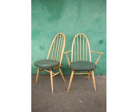 Set of six Ercol light elm Windsor quaker stick back dining chairs together with two matching carvers with green upholstered 