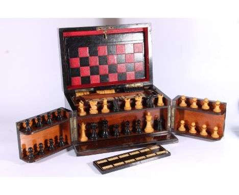 Victorian rosewood games compendium, the hinged lid opening to reveal inset red and black leather playing surface, boxwood dr