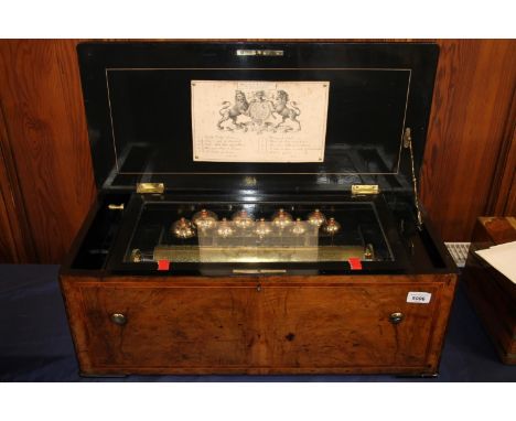 Swiss cylinder music box, c1875, the burr walnut case with tulipwood and boxwood crossbanding with ebonised moulding and brac