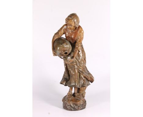 Goldscheider Art Nouveau bronzed terracotta figurine of a maid pouring into a bowl, c1900, the naturalistic base with Goldsch