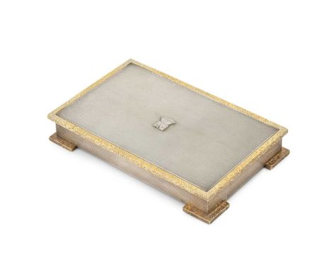 A silver and gold mounted rectangular cigarette box, with engine turned decoration, the projecting top border and feet mounte