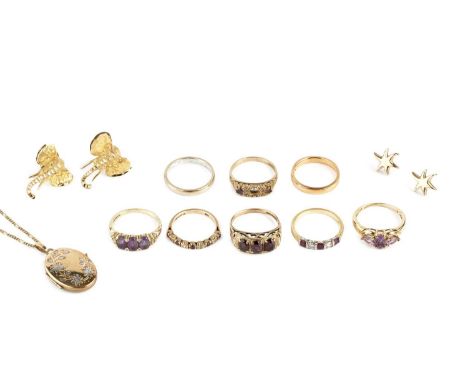 A collection of jewellery, to include a ruby and diamond half hoop ring, 18ct gold mounted, a pair of star ear studs by Cathe