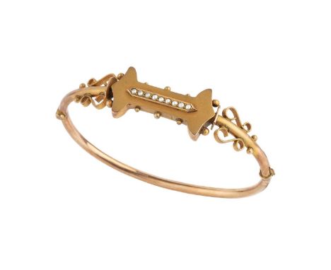 A Victorian half pearl bangle, of hollow hinged oval form, the frontispiece designed as a shaped panel inset with a line of h
