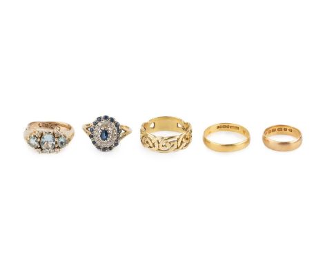 A collection of rings, comprising two blue stone and diamond dress rings, an 18ct gold dress ring, of Celtic design, a 22ct g