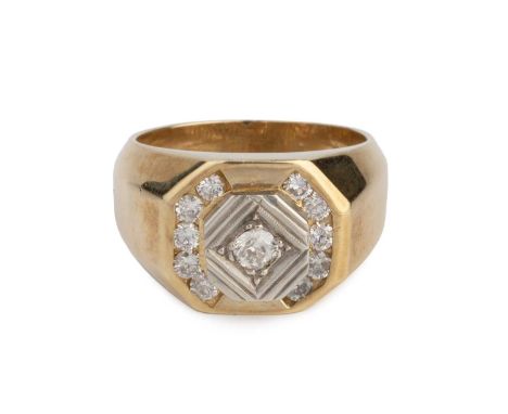 A diamond set panel ring, the octagonal panel centred with an old brilliant-cut diamond in reeded lozenge setting, enclosed b