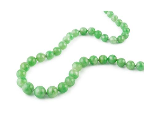 A jade bead necklace, designed as a continuous single strand of graduated jadeite beads, measuring approximately 5.8mm to 10.