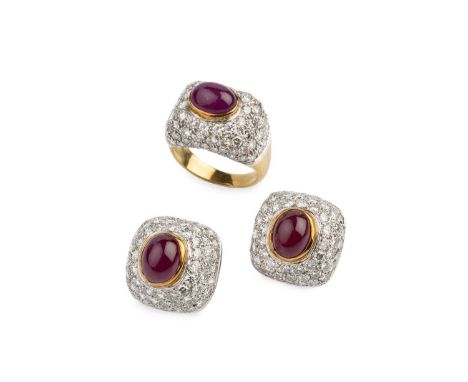 A ruby and diamond ring and earrings suite, of matched design, each centred with an oval cabochon ruby in collet setting, wit