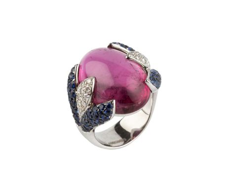 A pink tourmaline, sapphire and diamond cocktail ring by Rodney Rayner, the oval cabochon pink tourmaline enclosed to each sh