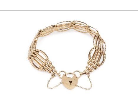 A 9ct gold fancy gate-link bracelet, with padlock clasp, length approximately 17cmGeneral surface wear throughout, patchy thi