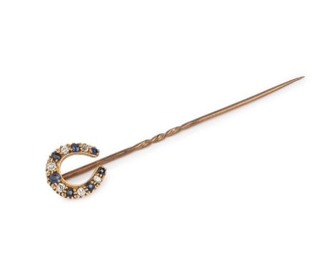 A sapphire and diamond set stick pin, modelled as a horseshoe, alternately set with circular mixed-cut sapphires and old and 