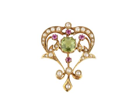 An early 20th century vari gem-set brooch/pendant, the openwork scrolled cartouche centred with an octagonal step-cut peridot