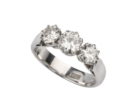 A diamond three stone ring, the graduated round brilliant-cut diamonds in eight claw settings, white precious metal mounted, 