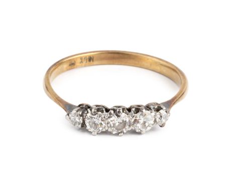 A diamond five stone ring, the graduated old brilliant-cut diamonds in claw setting, two colour precious metal mounted, stamp