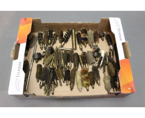 *  A large quantity of shotgun cleaning brushes, jags etc, to include a military oil bottle stamped with a broad arrow and EF