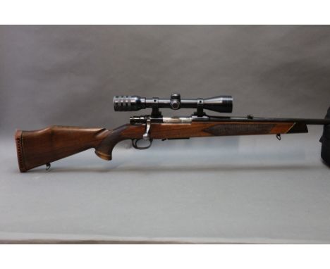 A Parker Hale Safari model cal 222R bolt action rifle, fitted with a Kassnar 3-9 telescopic sight and with detachable magazin