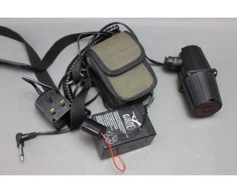 A gun mounted lamp, together with battery and spare battery.