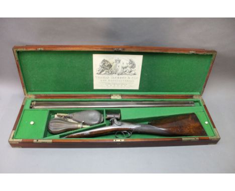 *  A percussion muzzle loading side by side shotgun, with 31 1/2" Damascus barrels, the breech end with gold lines and platin
