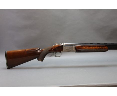 Nikko model 2100 12 bore over/under with 27" barrels, cylinder and cylinder choke, 2 3/4" chamber, ejector, top lever, select