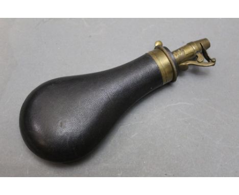 *  James Dixon &amp; Sons Ltd and Parker Hale, a leather covered powder flask, overall length 21 cm.