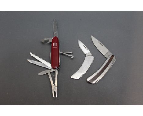 A Victorinox Ambassador Swiss Army Knife, with rare World logo, with fourteen tools including toothpick, together with a Klei