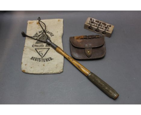 *  M Harvey &amp; Co Ltd Walsall, a leather ammunition pouch dated 1917, together with a vintage clay pigeon thrower, a Newca