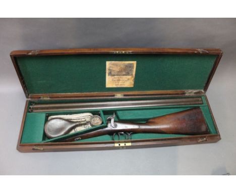 *  Richard Wallas of Wigton, a percussion muzzle loading shotgun, with 29" Damascus barrels the rib marked Wigton, the locks 