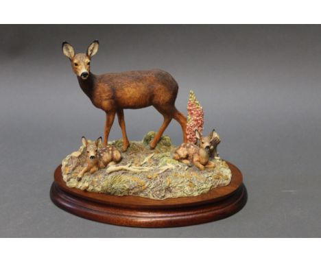 Border Fine Arts, a figure of a roe doe and twin kids "In Sunny Glade" model No. B0255, signed Ayres.