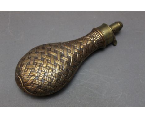 *  G &amp; J.W. Hawksley a copper bodied powder flask with basket weave design, length 20 cm.