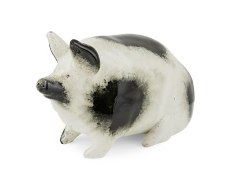 A SMALL WEMYSS WARE PIG  CIRCA 1900   sponged black on white, impressed mark WEMYSS WARE / R. H. & S., printed retailer's mar