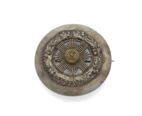 A GROUP OF THREE ROYAL SCOTS PLAID BROOCHES  one large example with applied crown, thistle border and regimental name with St