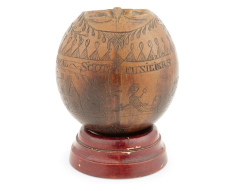 ROYAL SCOTS FUSILIERS - A CARVED BUGBEAR COCONUT CUP  the polished coconut shell with open rim to top, naively engraved with 