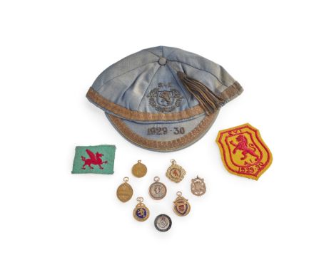 A COLLECTION OF SCOTTISH FOOTBALL INTERNATIONAL MEDALS AND CAP  AWARDED TO WILLIAM WISEMAN   comprising a blue cap with gilt 