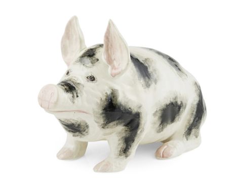 A LARGE WEMYSS WARE PIG  CIRCA 1900   sponged black on white, impressed mark WEMYSS WARE/ R. H. & S., printed retailer's mark