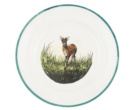A WEMYSS WARE PLATE  CIRCA 1900   decorated by Karel Nekola depicting a hind in a grassy field, impressed mark WEMYSS WARE/ R