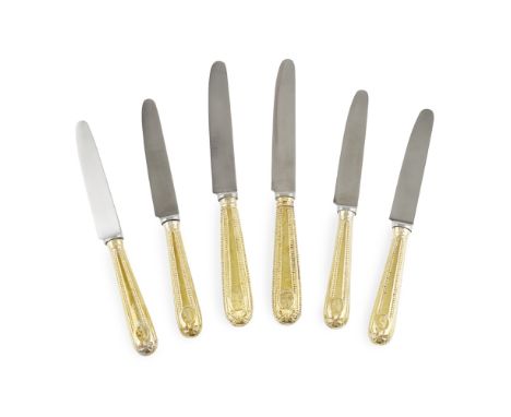 A RARE SUITE OF TWENTY FOUR GEORGE III SCOTTISH SILVER GILT TABLE AND DESSERT KNIVES  DAVID MARSHALL, EDINBURGH CIRCA 1785 - 