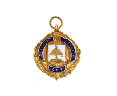 CHIC GEATONS OF CELTIC F.C., GLASGOW CHARITY CUP WINNERS GOLD MEDAL, 1937  the obverse with enamel crest bordered by inscript