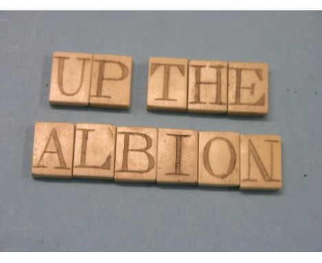 A Victorian bone alphabet, twenty-six engraved cubes contained within rosewood case, and a Victorian engraved bone pipe tampe