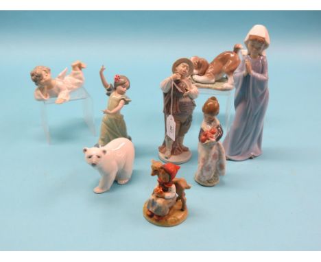 Six various Lladro models, a Nao young nun, and a Goebel seated girl with lamb
