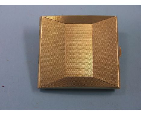 An engine-turned 9ct. gold cigarette case,  Birmingham 1928, 95 grams SEE ILLUSTRATION