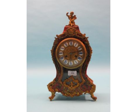 A 19th century French boullework mantel clock, eight-day movement striking on a gong, rococo-style case mounted with ormolu a