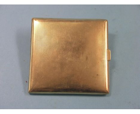 An engine-turned 9ct. gold cigarette case, Birmingham 1933, 95.8 grams