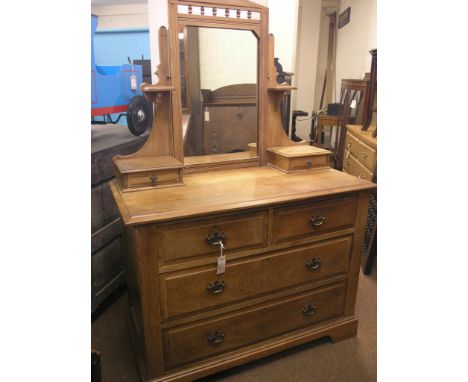 A late Victorian walnut dressing chest, mirror and trinket drawers above two short and two long drawers, 3ft. 6in. 