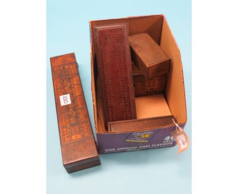 A Victorian turned wood chess set, complete and boxed, together with a boxed Domino set, three cribbage boards, and other gam