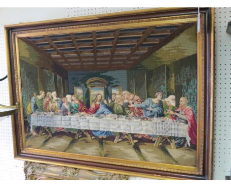 A large, gilt-framed tapestry, The Last Supper, 24 x 36in., and two other framed tapestry pictures