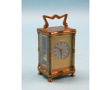 An early 20th century French carriage clock, engine-turned and silvered dial signed Searle & Co. Ltd., Royal Exchange, twin-t