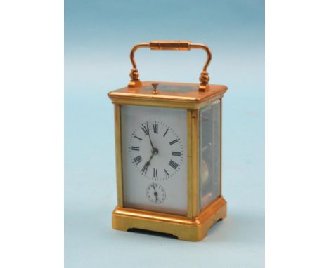 An early 20th century French repeating carriage clock, enamelled dial with subsidiary alarum, gong-striking movement, compens