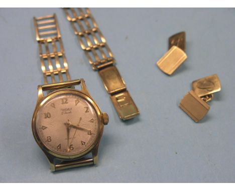A gentleman's 9ct. gold Rotary wristwatch, on 9ct. gold strap, faults and a pair of 9ct. gold cuff-links, latter 9.5 grams 