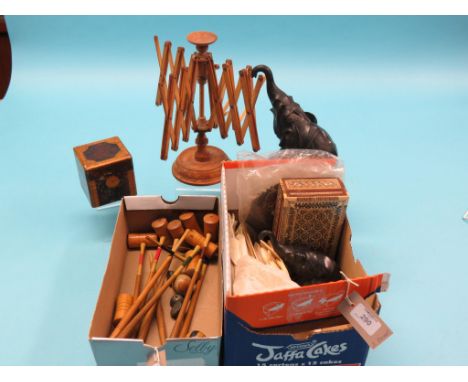 A table-croquet set, cantilever wool-winder, small Georgian-style tea caddy with simulated inlay, kid-leather gloves, etc.