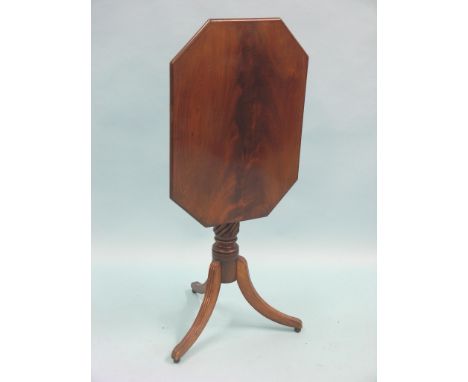 An early Victorian mahogany tripod table, elongated octagonal top on spiral-twist stem, top 2ft. 2in.