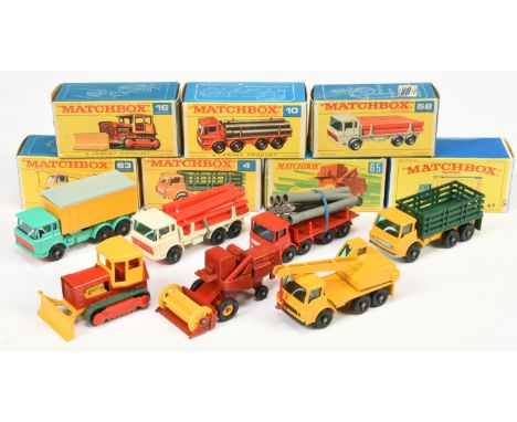 Matchbox Regular Wheels group of Commercial Vehicles to include) 4d Dodge Stake Truck with tow guide; ; (4) 10d Leyland Pipe 